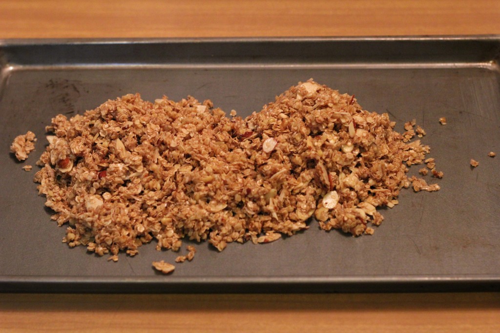 baked granola on cookie sheet