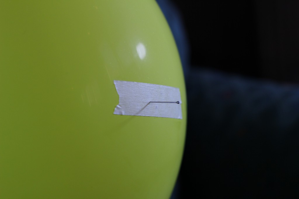 Pin in balloon doesn't pop